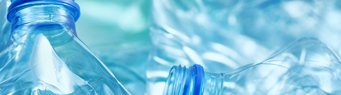 Crumpled blue bottles for recycling.